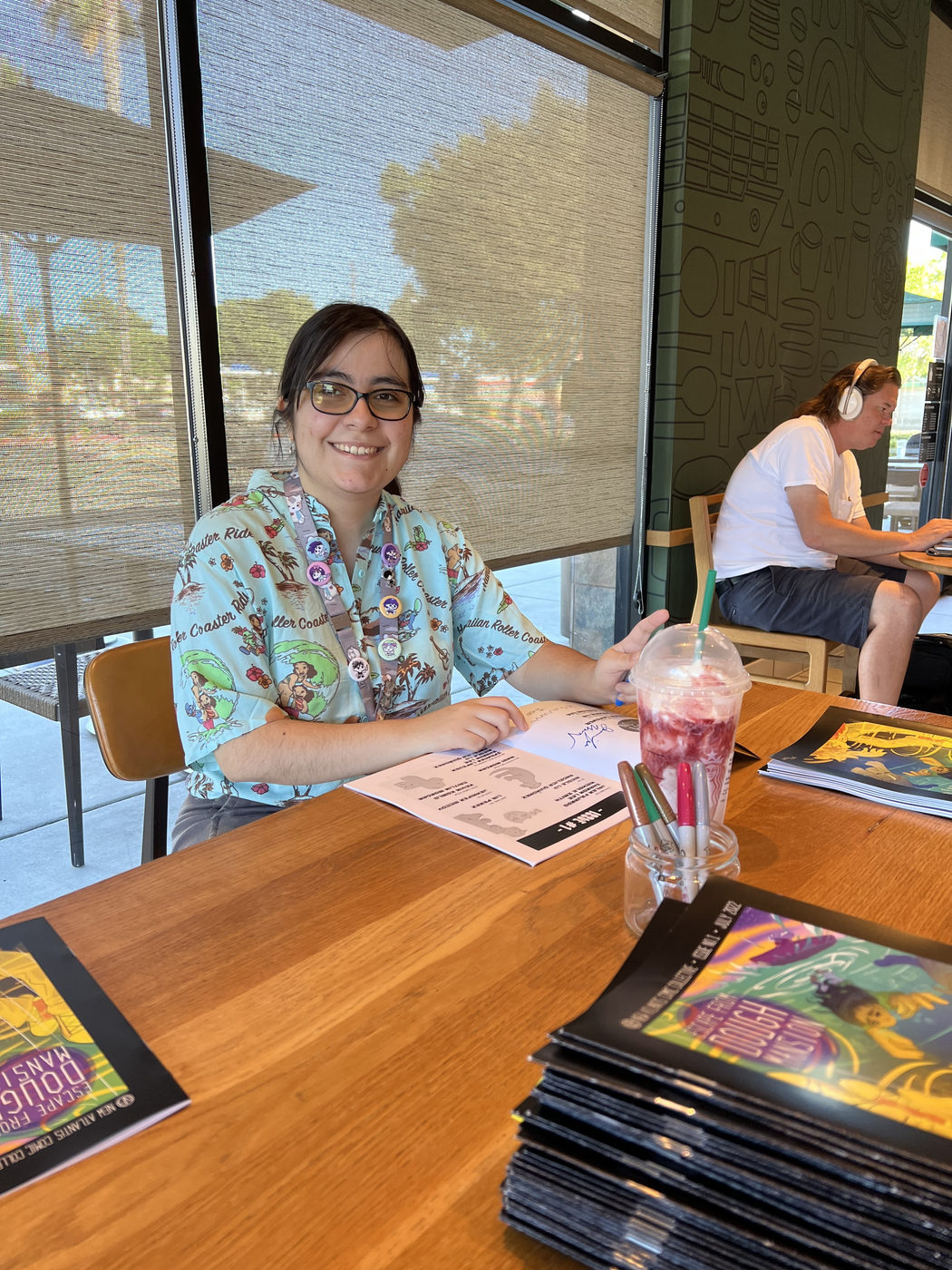 Artist at the Escape From Dough Mansion signing party